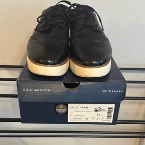 Cole Haan Black Leather Wingtip Derbies with Ivory Sole
